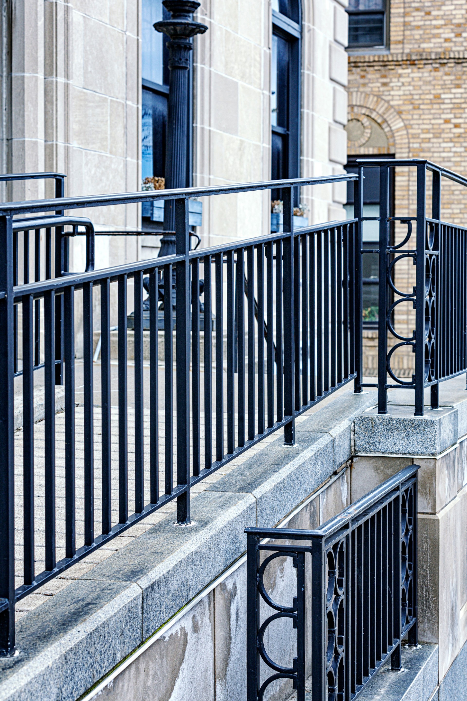 Close-Up Detail of Wrought Iron Railing on Public City Building
